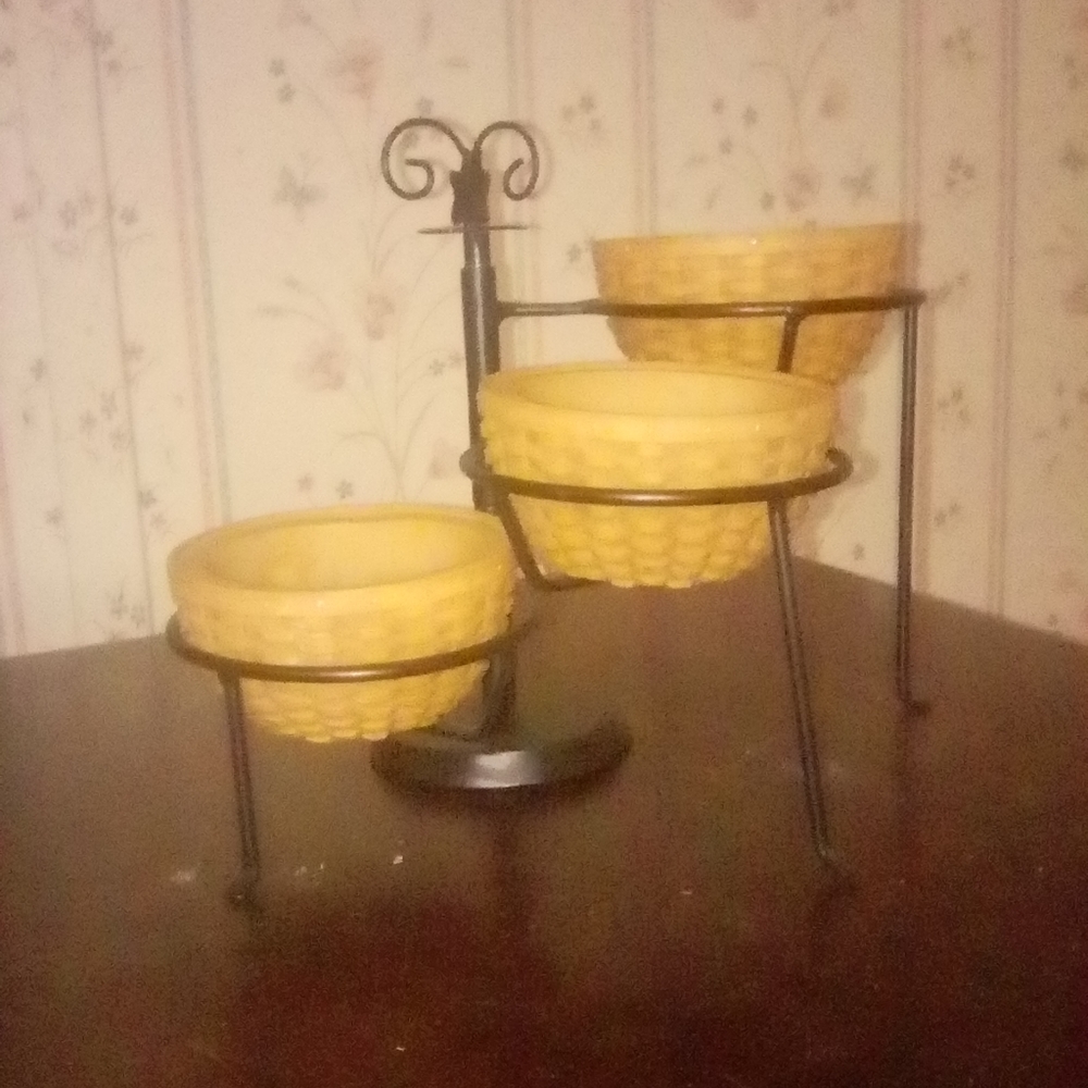 Three tier ceramic basket stand.